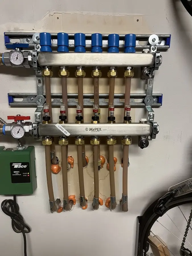 Plumber performing Water Heater Repair at a residential property in West Pittston